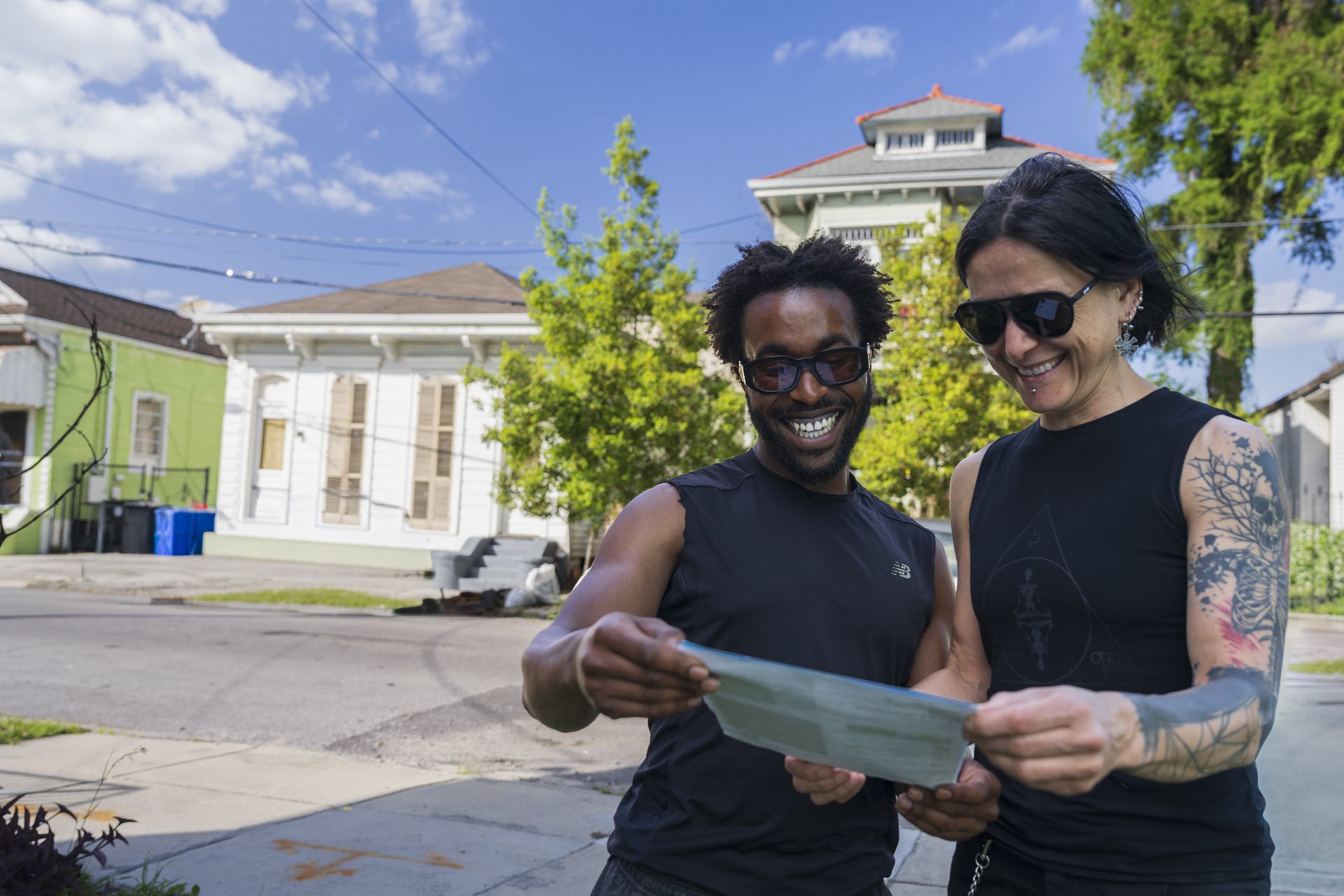 Two people reviewing a document