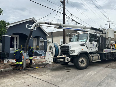 DPW crews cleaning catch basins